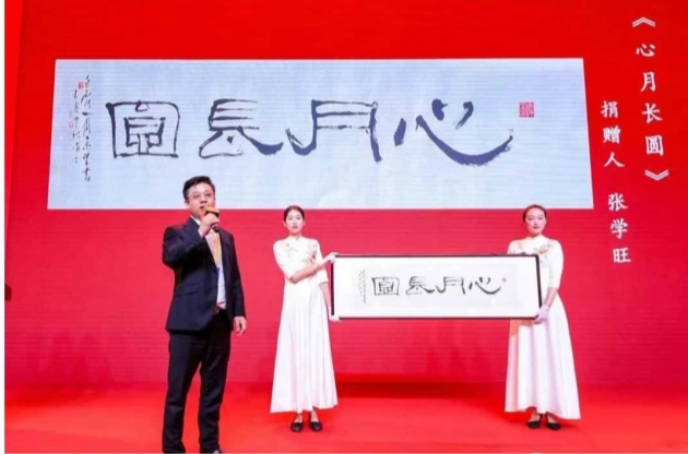 以心為燈 照亮一個女孩的求學路——張學旺董事長的公益長跑